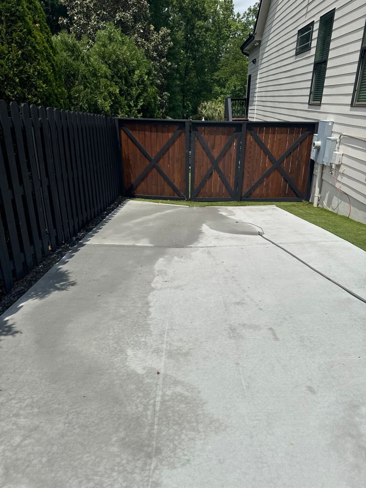 Our concrete cleaning service is designed to clean and seal your concrete driveway, patio, or sidewalk. We use a specialized process that safely removes dirt, grime, and stains while sealing the surface to protect it from future staining. for H2Whoa Pressure Washing, Gutter Cleaning, Window Cleaning in Cumming, GA