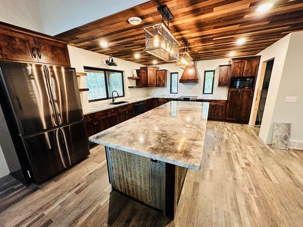 Transform your home with our durable and stylish epoxy countertops, offering a seamless finish that resists heat and stains. Perfect for any kitchen or bathroom renovation project. for Mr Moles Painting in Bemidji, MN