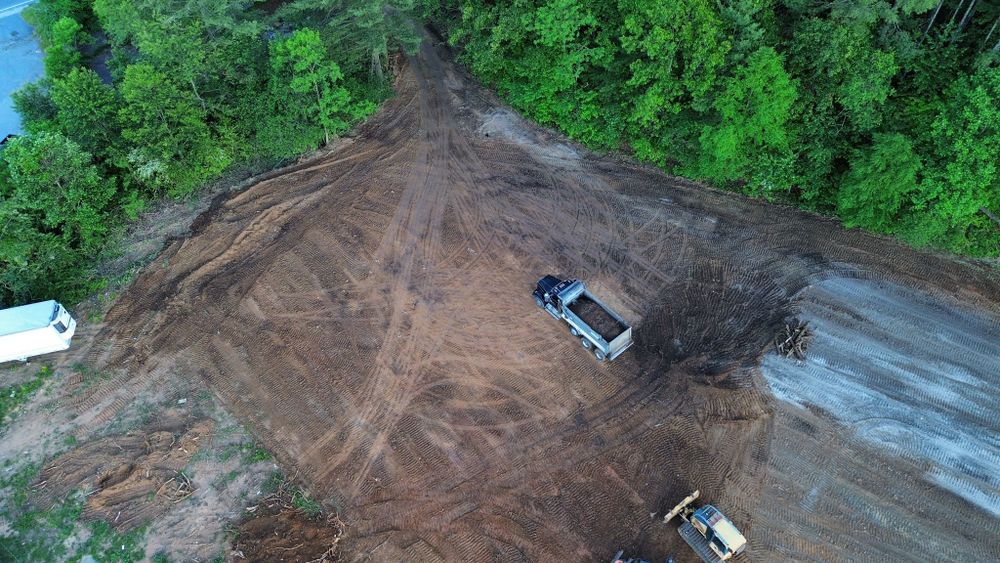 Our Leveling service expertly prepares your land for construction by creating a stable, even foundation. We ensure precise grading to enhance drainage and support the integrity of future structures. for PCC Land Works in Marshall, NC