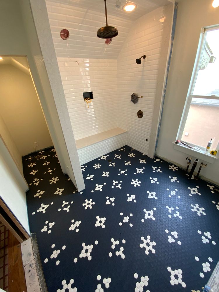 Upgrade your bathroom with our professional tiling service. Our experienced team will expertly install high-quality tiles to transform your space, creating a stunning and durable finish for your home. for Tafoya Tile & Custom Designs in Boulder, CO