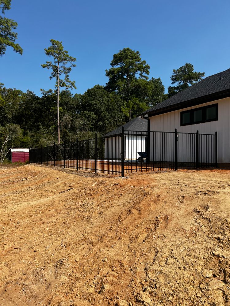 Our Metal Fencing service offers expert fence installation for added security and aesthetic appeal to your property. Ensure durability and style with our professional construction team. for Arnold Construction in Magnolia, TX