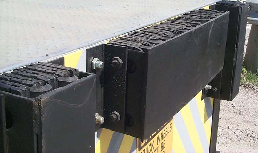Enhance your warehouse's safety with our Dock Bumpers service, protecting vehicles and structures from impact damage while streamlining parking. Durable and reliable, we provide peace of mind for homeowners. for Jones Garage Doors and More in Coatesville, IN