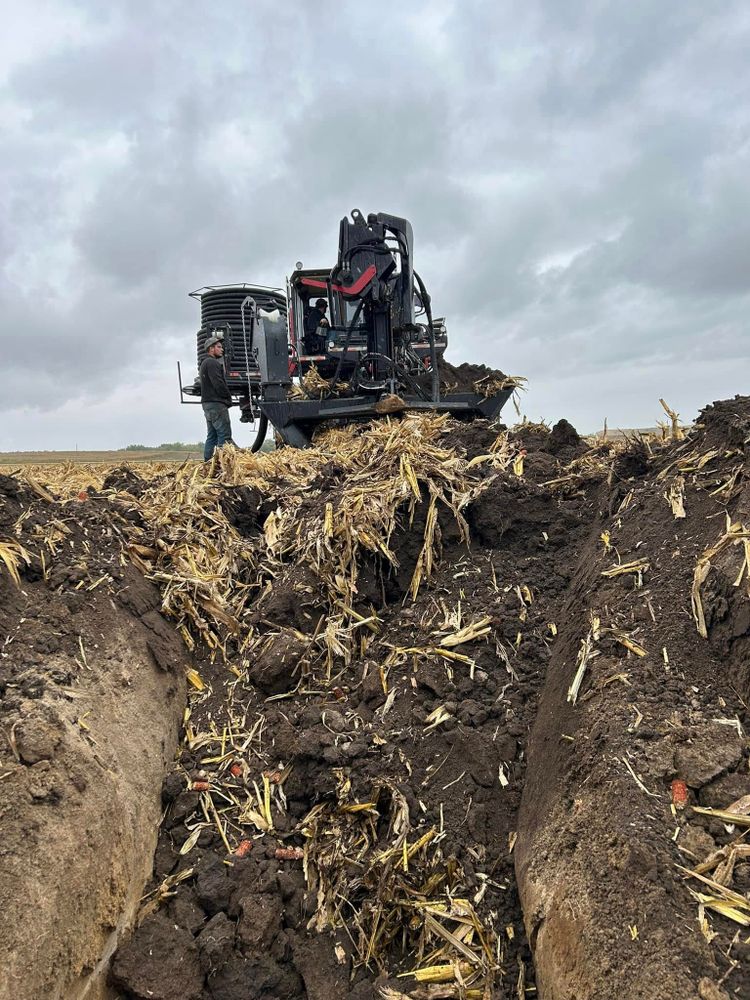 Our trenching service offers precise and efficient digging for utility installations, drainage systems, and landscaping needs. Trust our experienced team to enhance your property's functionality while ensuring safety and minimal disruption. for M & W Tiling and Excavating in Calamus, IA