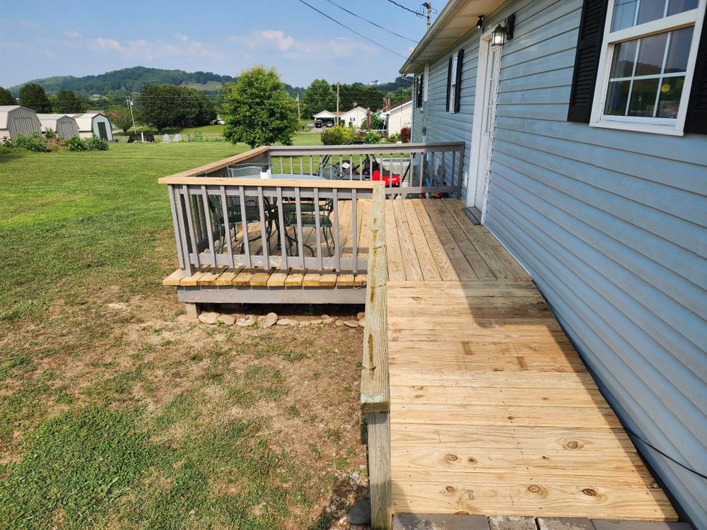 Enhance your outdoor living space with our expert deck and patio installation. Our team designs and builds durable, stylish solutions tailored to complement your home, ensuring a perfect blend of functionality and aesthetics. for Big Oak Construction in Athens, TN