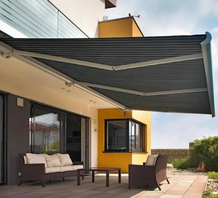 Our Retractable Awnings service offers stylish and functional shade solutions for your home's windows, protecting against the sun's harsh rays while enhancing your outdoor living space with customizable options. for Deluxe Window Solutions in Houston, TX