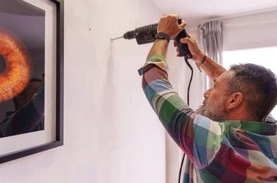 Our Handyman Services offer professional hanging of pictures and expert painting to enhance your home’s aesthetic, ensuring perfection in every detail while providing reliable support when you need it most. for Amelia Homes Solutions in Daphne, AL