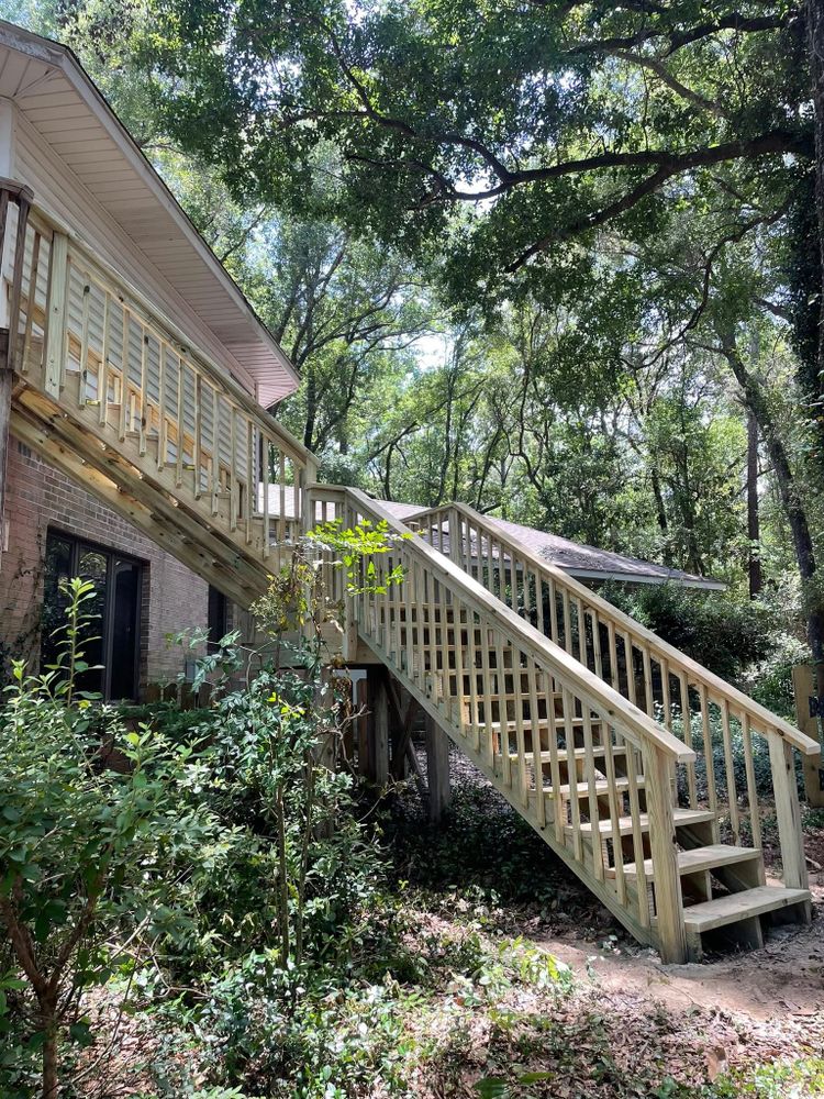 Enhance your outdoor living space with our expert deck construction services. We offer customized designs, quality materials, and skilled craftsmanship to create a beautiful and durable deck for your home. for Jaguar Fence in Mobile, AL