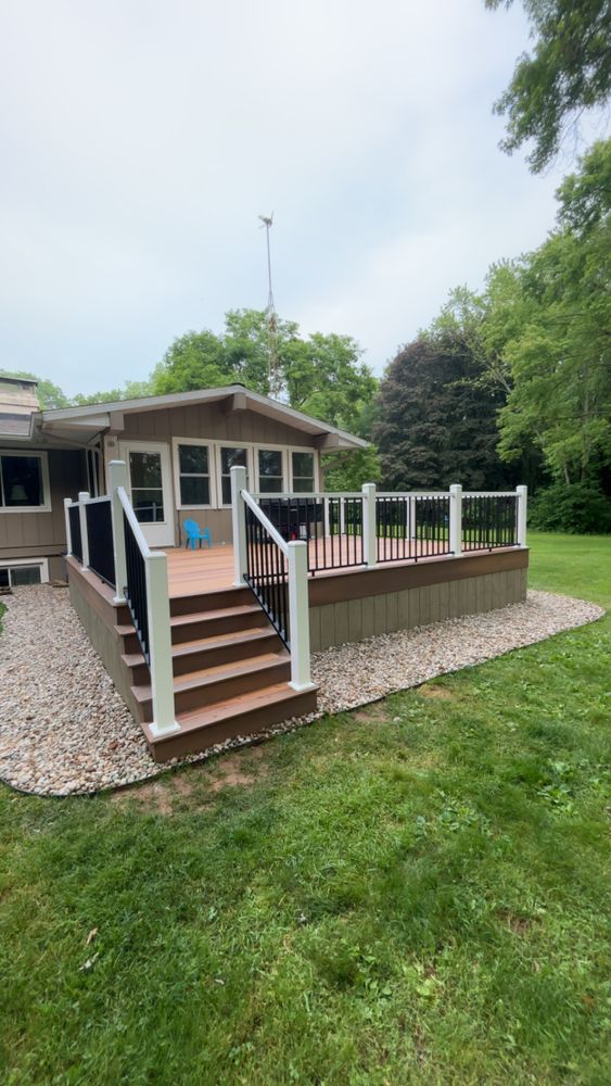 Our deck & patio installation service delivers high-quality outdoor spaces tailored to your needs, enhancing home aesthetics and functionality with durable materials and expert craftsmanship for a perfect outdoor living area. for Kingdom Carpentry in Jackson, MI