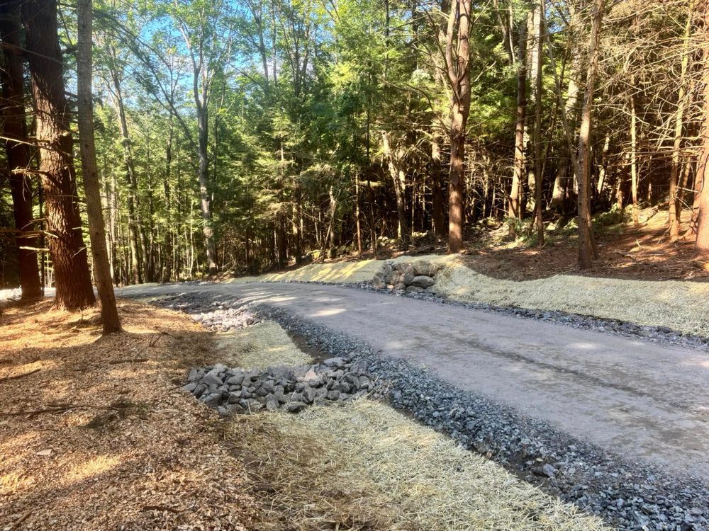 Our Private Road Grading service enhances your road's longevity and appearance by ensuring a smooth, well-leveled surface, improving accessibility and safety while preventing erosion for lasting durability. for JKT Contracting in Keene, NH