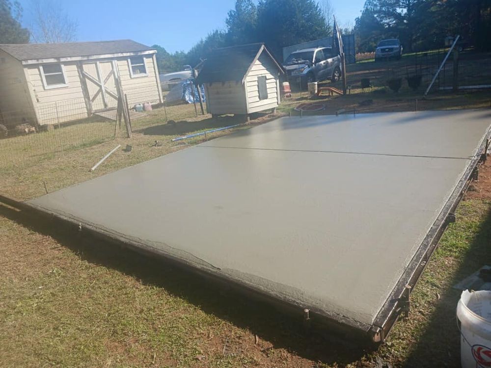Our Concrete Slab Construction service provides durable, expertly crafted slabs perfect for patios, driveways, or foundations. We ensure quality materials and meticulous workmanship to enhance your home's functionality and aesthetic appeal. for Stinson Concrete & Finishing LLC in Rock Hill, SC