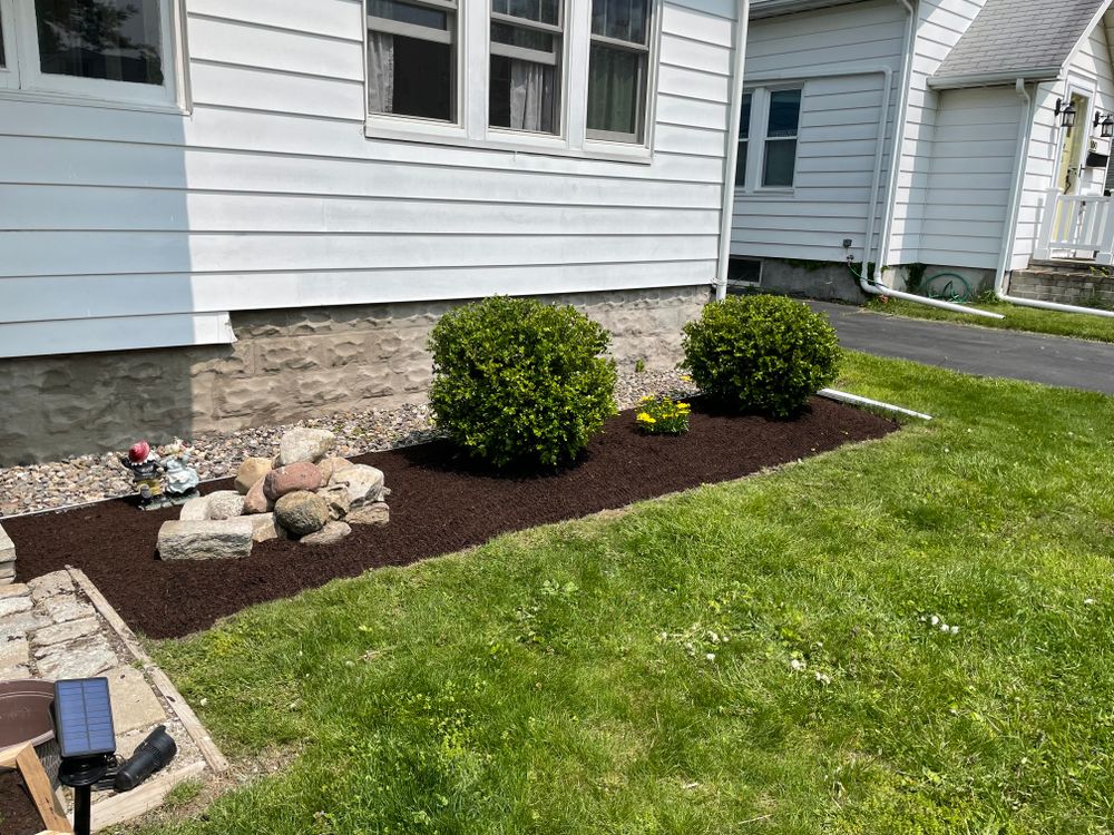 We offer mulch installation services to help beautify and protect your garden soil. Our experienced team will work quickly and efficiently to give you the best results. for Bumblebee Lawn Care LLC in Albany, New York