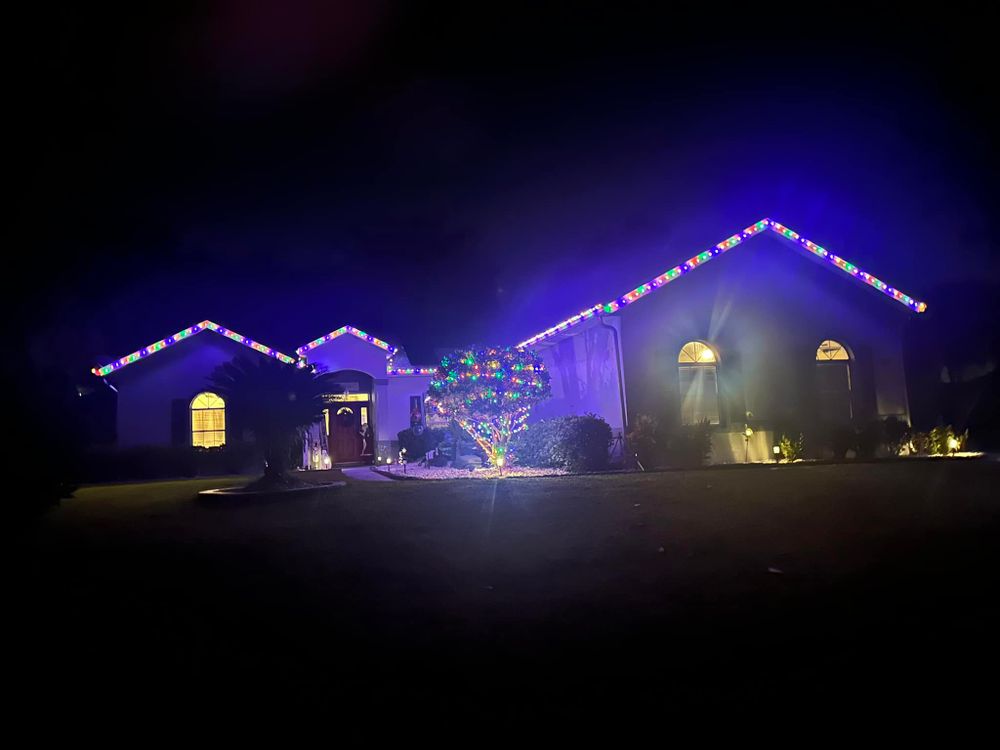 Enhance your home's festive charm with our expert Holiday Lighting service, offering professional installation and personalized designs to beautifully illuminate your outdoor spaces alongside our top-quality fencing solutions. for Browne’s Yard Creations in Fruitland Park, FL