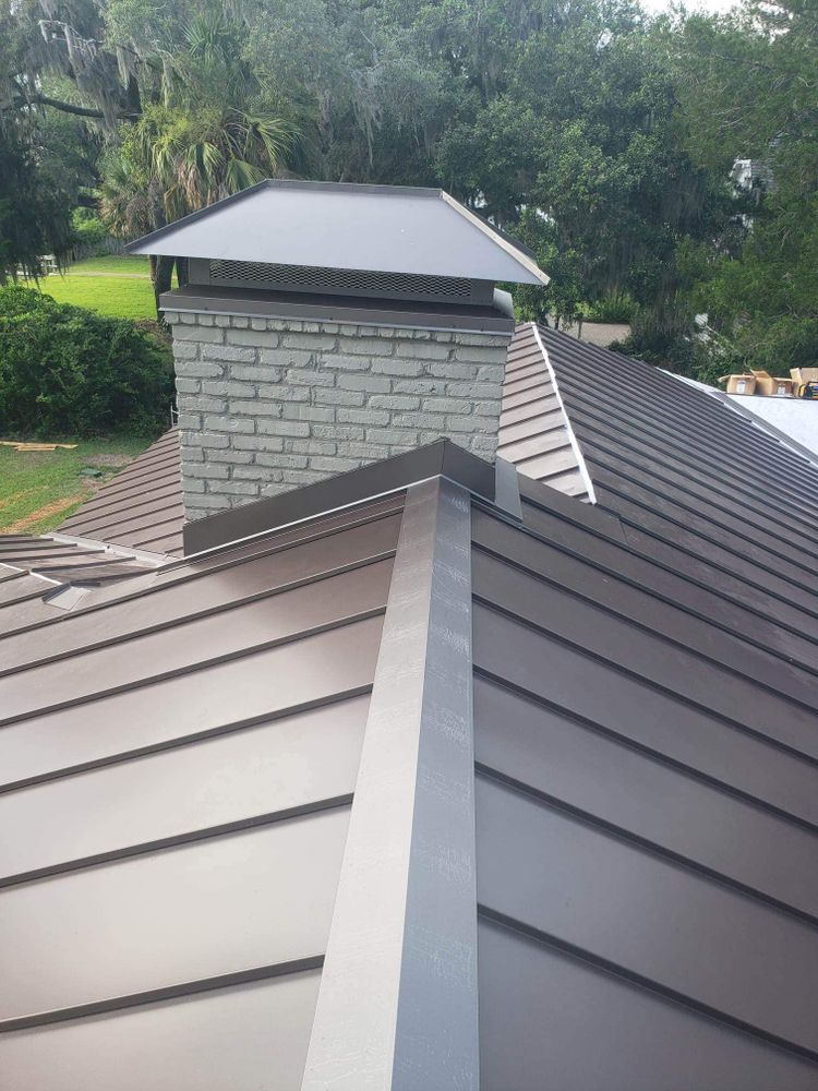 Our standing sean metal roofs service offers homeowners a durable and long-lasting roofing option that enhances the aesthetic appeal of their homes while providing excellent protection against harsh weather conditions. for Safe Roofing Inc in Jacksonville, NC