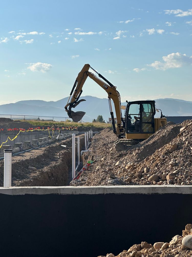 Our Sewer & Water Lines service ensures efficient installation, repair, and maintenance of underground pipes to provide you with reliable access to clean water and proper sewage disposal solutions for your home. for Rocky Mountain Dirt Work in Missoula, MT