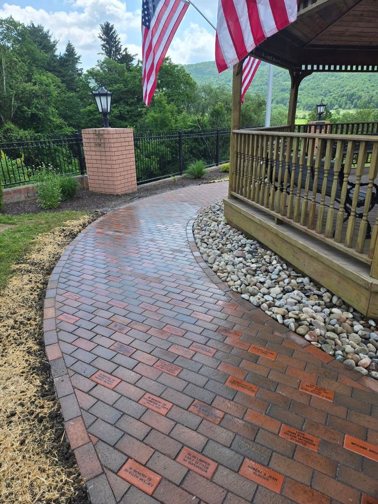 Enhance your home's aesthetic and functionality with our Walkway Construction service, providing durable, custom-designed paths that seamlessly blend into your landscape while ensuring safe and beautiful access throughout your property. for Fancher's Lawns & Landscaping LLC in Schoharie County, NY