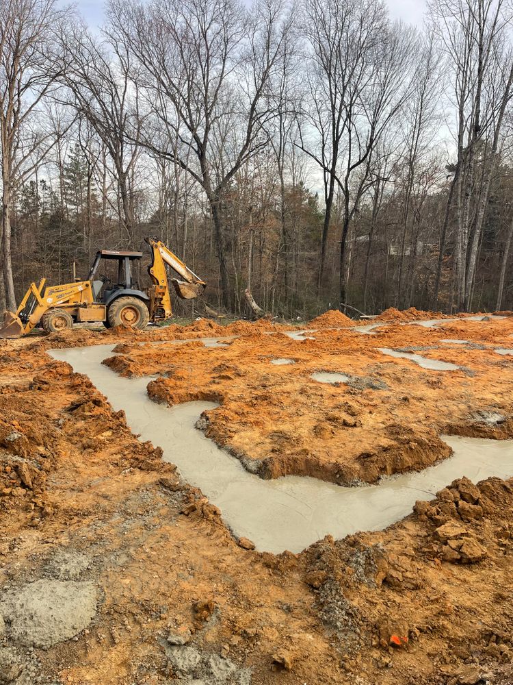 Pad, piers and foundation. for Maness Trucking & Excavation in Lexington, TN