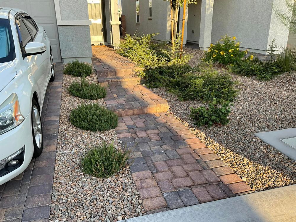 Our professional landscaping team specializes in installing and repairing pavers to enhance the aesthetic appeal and functionality of your outdoor living space, creating a beautiful and durable surface for your home. for Top It Off Landscaping LLC in Henderson, NV
