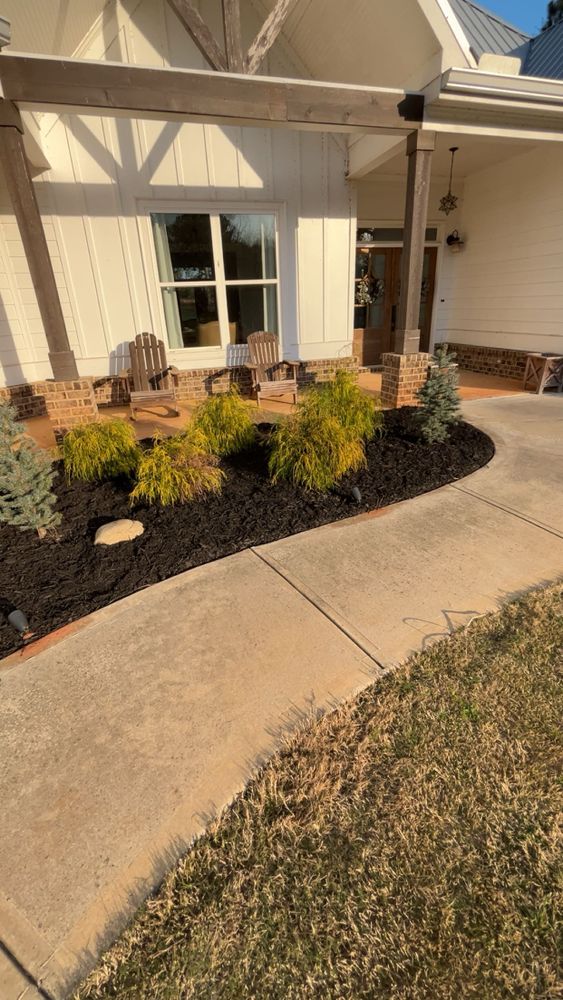 Enhance your garden's health and aesthetics with our professional mulch installation service, providing effective moisture retention, weed control, and soil enrichment to ensure a vibrant landscape year-round. for WD Lawn Services in Loganville, GA