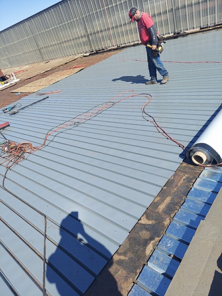 Our Commercial Roofing service ensures durable, high-quality roofs for businesses, utilizing superior materials and skilled craftsmanship to provide lasting protection and energy efficiency tailored to your specific commercial property needs. for Madden Improvements in Denver, CO