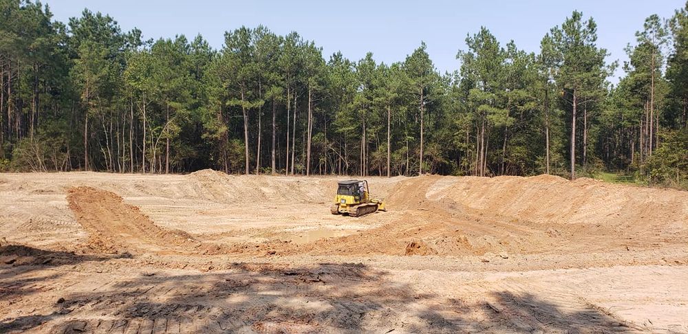 Our Dirt Work service prepares your property with precision grading, excavation, and land clearing, ensuring a solid foundation for construction or landscaping projects while enhancing drainage and overall site stability for lasting results. for J. McMillan Enterprises in Lovelady, TX