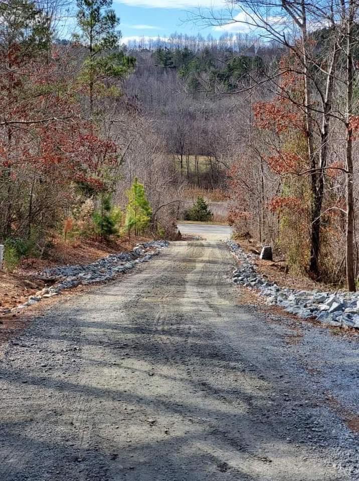 Our Roadbeds service provides durable and expertly constructed bases, ensuring your driveways and pathways are stable and long-lasting. Trust us for quality groundwork that supports safe, smooth transportation on your property. for CSM Hauling in Rutherfordton, NC