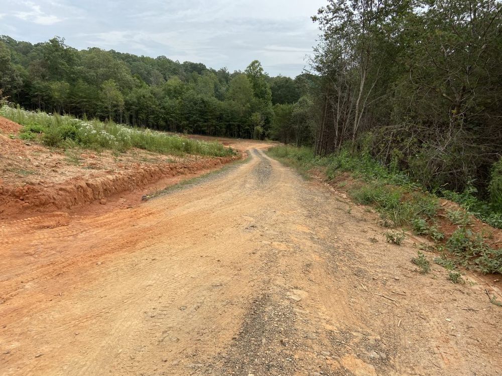 Our Roadbeds service provides homeowners with expertly constructed foundations for driveways and private roads, ensuring stability and longevity through precise grading, compaction, and drainage solutions tailored to your property’s specific needs. for Madsen Excavation, LLC in Mayfield, UT