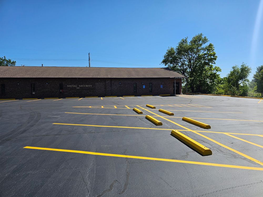 Our professional seal coating service enhances the appearance and longevity of your driveway by providing a protective layer that seals out water, oil, and UV damage for long-lasting durability. for Fine Line Striping in Jackson, MO