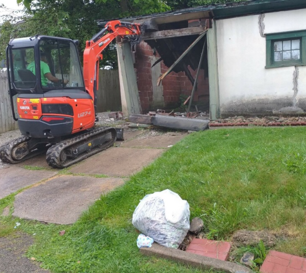 Our Demolition service provides homeowners with the option to safely and efficiently remove unwanted structures or areas within their property, clearing space for new projects or renovations. for Nates Demolition and Clean-Out Services LLC in Pittsburgh, PA