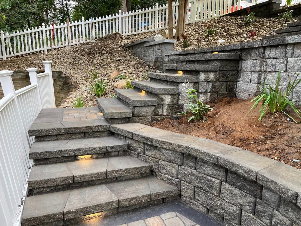 Our company offers a wide range of hardscape services, from fire pits and patio installation to concrete driveways, sidewalks and patios. We'll work with you to create the perfect outdoor space for your home. for Keyes Exteriors in Stafford, VA