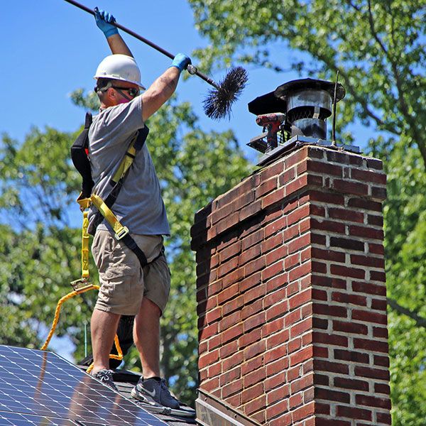 Enhance your home's safety with our expert chimney cleaning service, designed to remove soot and debris while complementing our comprehensive roof cleaning solutions for a spotless, protected exterior. for Purifico Pressure Washing Solutions in Birmingham, AL