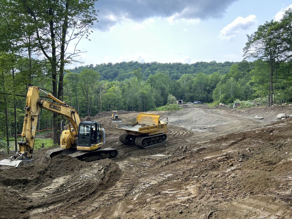 Carving a Pond into a Mountain Side for Andy Naylor Excavation in Johnson, VT