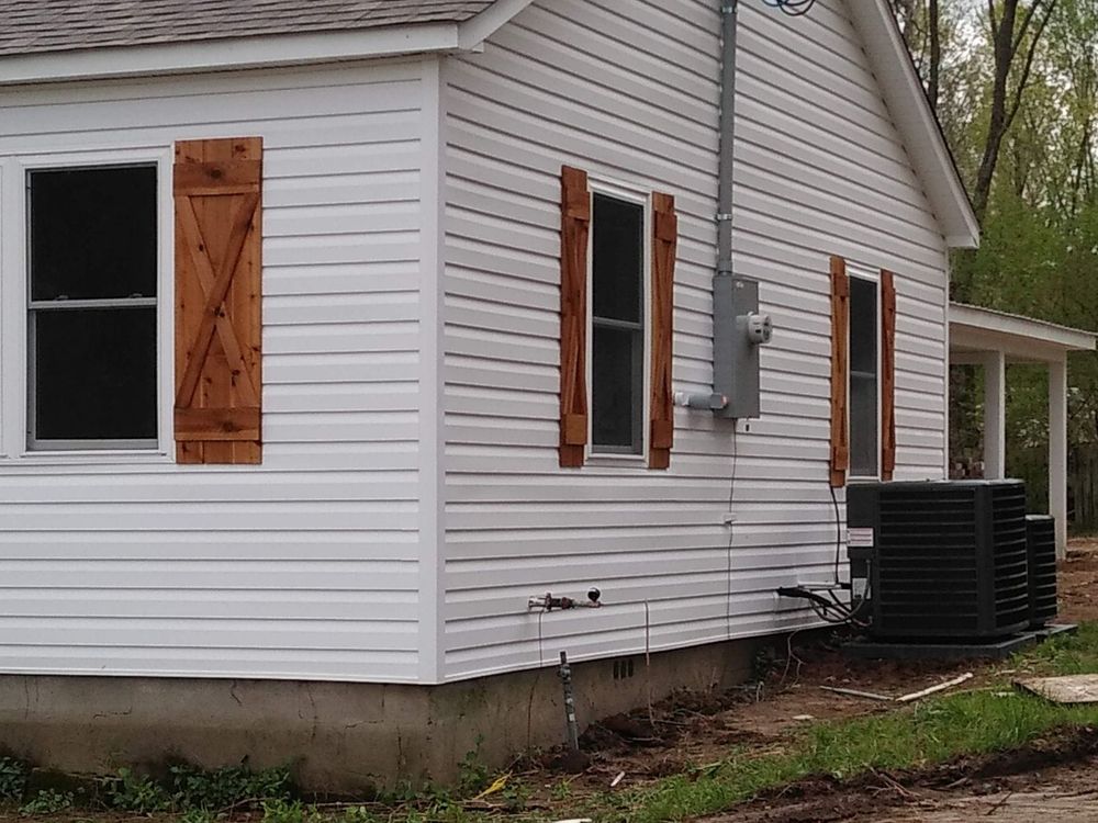 Enhance your home's curb appeal and energy efficiency with our expert vinyl siding house services, providing durable, low-maintenance solutions designed to withstand weather conditions while maintaining a beautiful exterior for years. for Barnes Construction TN in Covington, TN