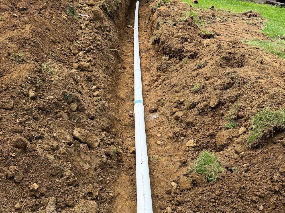 Our expert drainage service ensures efficient water management and prevents property damage by designing and installing effective drainage solutions tailored to your home's specific needs, promoting long-term protection and peace of mind. for Triple C’s Excavation in Ashford, CT