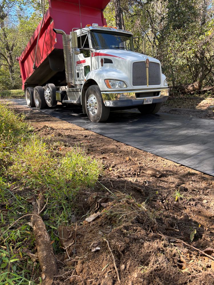 Our Milling Delivery & Spreading service provides efficient and precise distribution of milled materials for your driveway or landscaping projects, ensuring a smooth, durable finish that enhances your home's curb appeal. for 9999 Building and Renovation LLC in Warrenton, VA