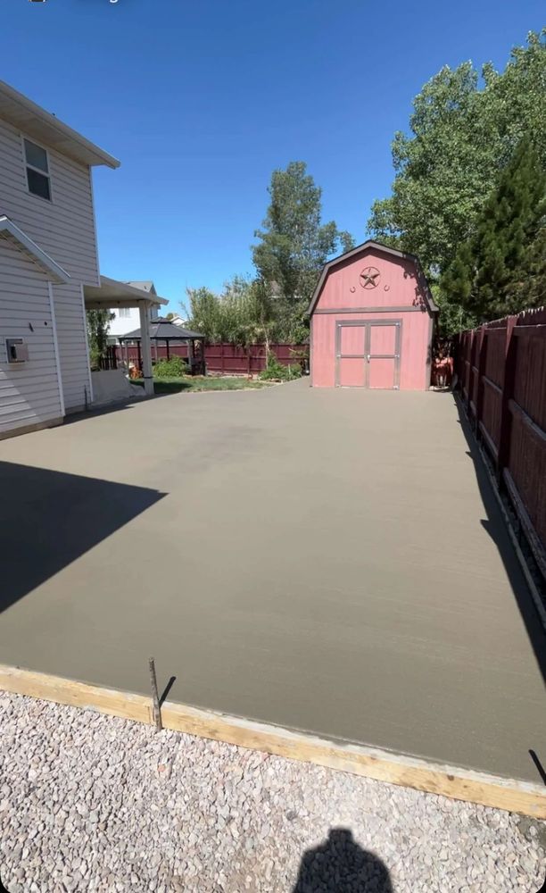 Enhance your outdoor space with our expert staining service for concrete retaining walls, providing long-lasting protection and an attractive finish that complements your home's aesthetic and withstands weather elements. for TNT Concrete and Construction LLC in Roy, UT