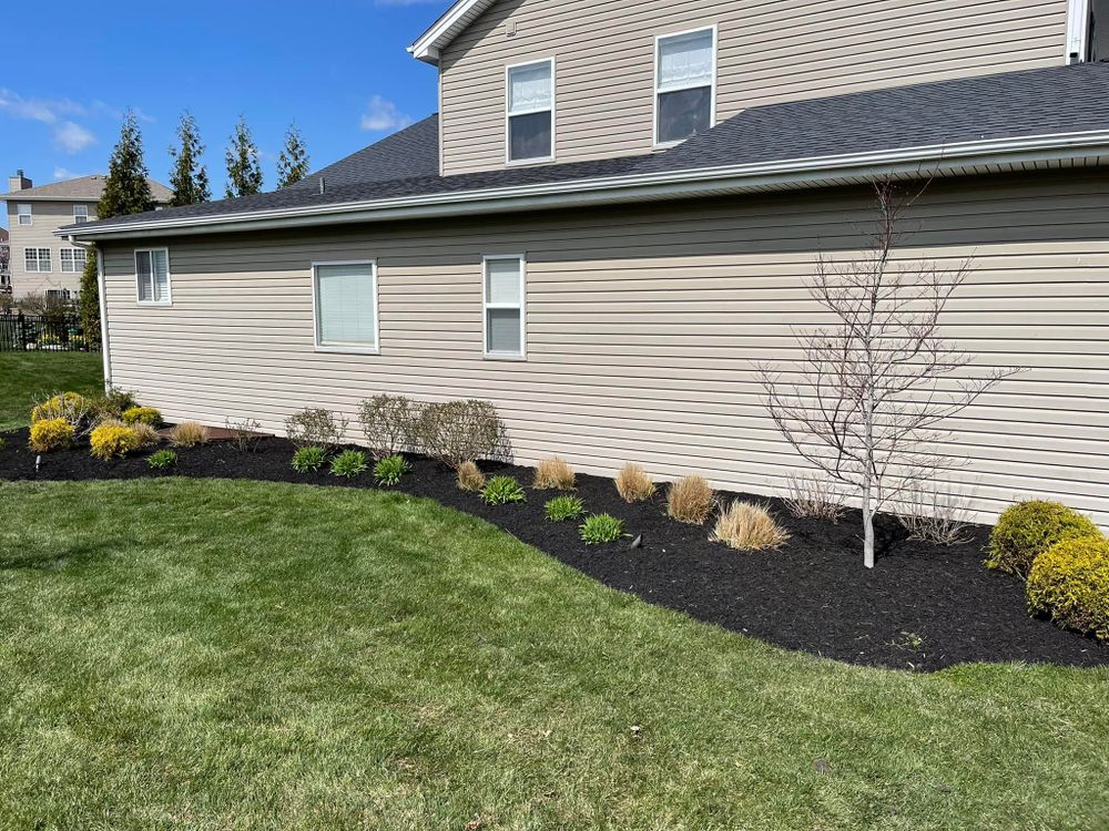 Our Mulch Installation service provides homeowners with an affordable, low-maintenance way to enhance the appearance of their landscape while promoting soil health and moisture retention. Transform your outdoor space today! for Delgado Landscape Management  in St. Charles,  MO