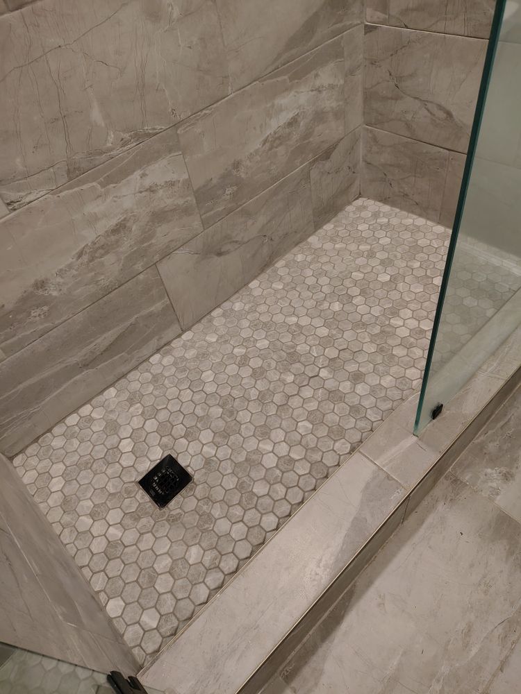 Transform your bathroom with our expert renovation services, offering customized designs, quality materials, and skilled craftsmanship to create a beautiful and functional space that enhances your home's comfort and value. for MHS Solutions in Rydal, GA