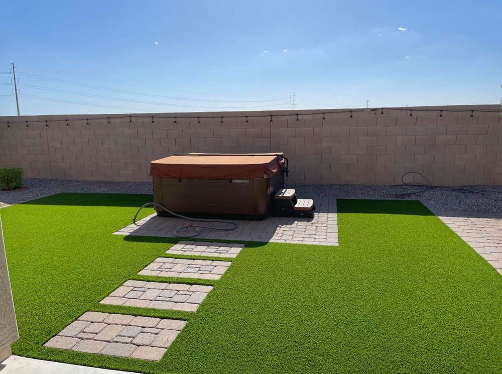 Enhance your lawn with our premium artificial turf grass, offering a lush, maintenance-free solution that's eco-friendly and durable—perfect for transforming your outdoor space into a beautiful oasis year-round. for Vix Landscape in Buckeye, AZ