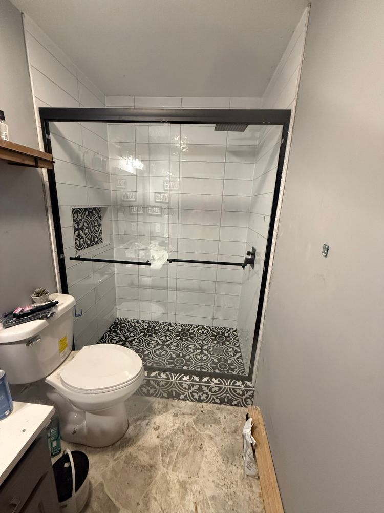 Transform your bathroom with our expert renovation service, enhancing both style and functionality. We offer tailored designs and high-quality craftsmanship to create a personalized oasis in your home. for SDM Construction LLC in Lawrence, KS