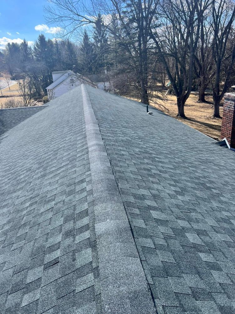 Our Roofing Replacement service offers durable and energy-efficient metal roofing solutions, providing homeowners with a stylish, weather-resistant option to enhance their property's protection and increase its overall value. for JNR Home Improvements in Bangor, PA