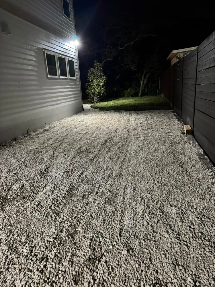 Enhance your outdoor space with our expert rock installation service, providing a durable and aesthetically pleasing alternative to mulch installation that complements any landscape design beautifully. Transform your yard quickly and effectively. for Four Corners Sod in Saint Augustine, FL