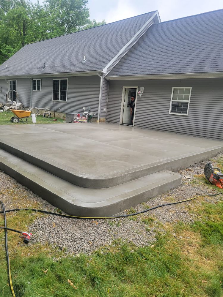 Transform your outdoor space with our expert Patio Design & Installation service, offering customized concrete solutions that blend functionality and beauty, enhancing your home's appeal and creating the perfect relaxation spot. for Bear Concrete & Outdoor Services in Auburn Hills, MI