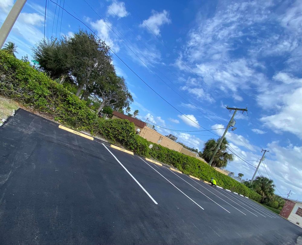Enhance your property's value and functionality with our expert Asphalt Parking Lot Construction. We deliver durable, aesthetically pleasing surfaces using quality materials, ensuring long-lasting satisfaction and efficient project completion for homeowners. for PavePros in West Palm Beach, FL