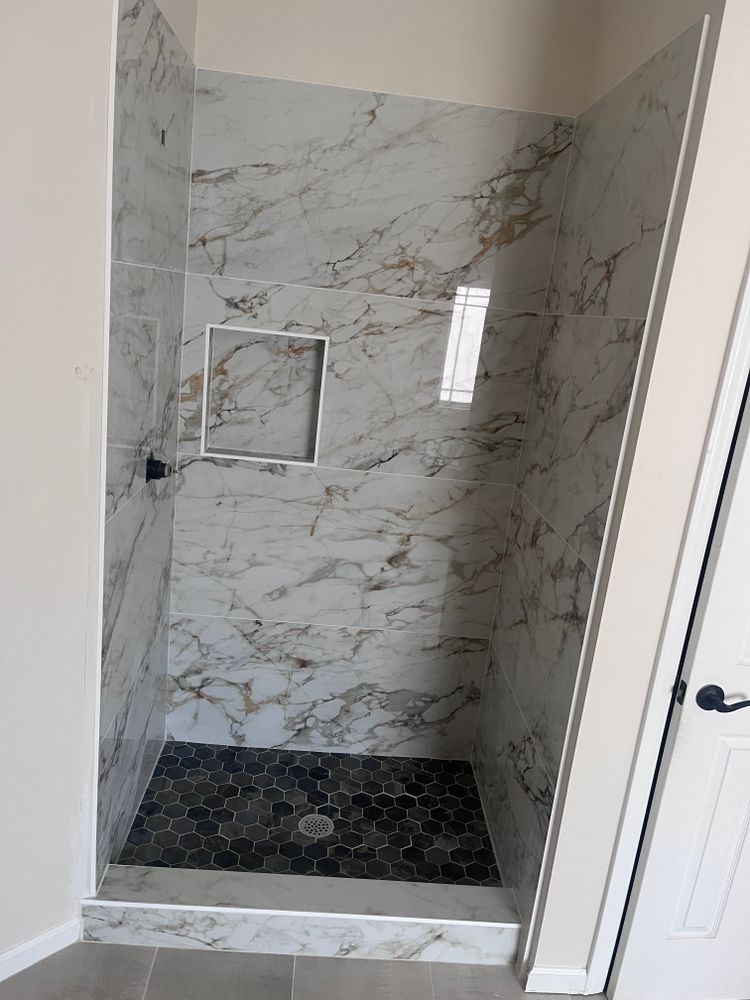 Enhance your home with our expert tiling services, offering precise installation and a wide range of styles. Trust us to transform any room into a beautiful, durable space you'll love. for Hardwood Renovations in Buford, GA