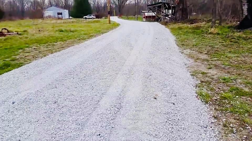 Transform your property with our comprehensive Driveway Construction service, expertly clearing land to create a smooth, durable driveway that enhances accessibility and adds value to your home. for Moffett Equipment Services And Rentals in Opelika, AL