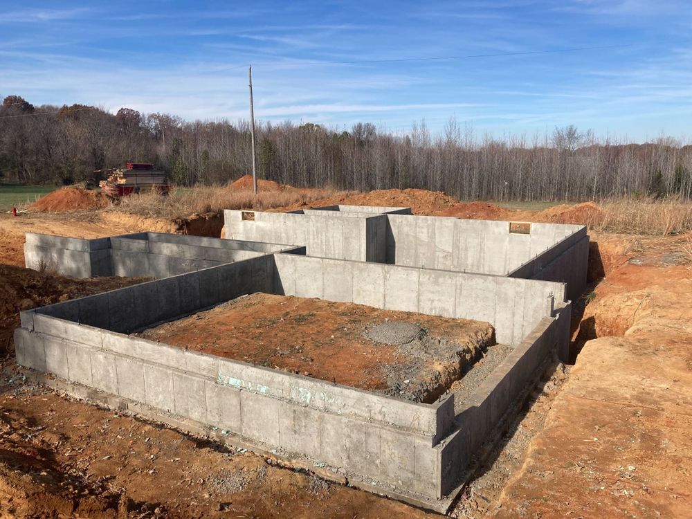 Our Foundation Laying service delivers strong, level, long-lasting concrete foundations for homes and additions. We handle excavation, forming, pouring, and finishing with precision to ensure structural stability from the ground up. for Curtis Concrete & Bobcat Services LLC in Geneva, FL