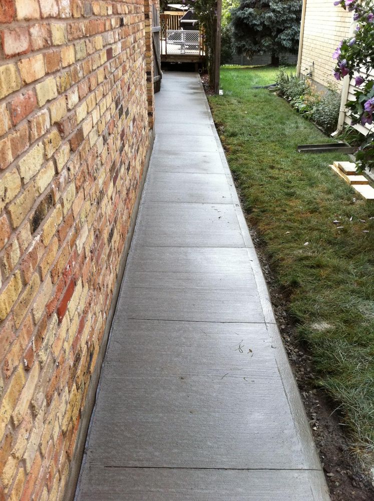 Our Sidewalk Installation service provides homeowners with professionally poured and finished concrete walkways that enhance the aesthetic appeal and functionality of their property, adding value to their home. for A Paradise Concrete & Construction  in  Renton,  WA