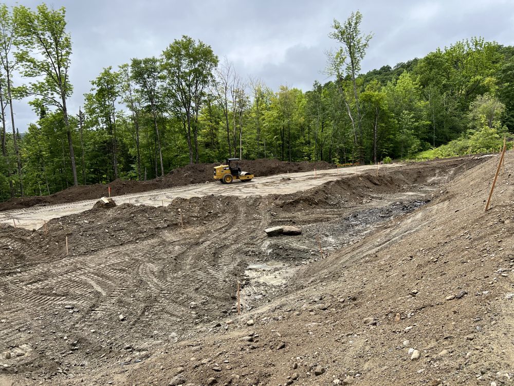 Carving a Pond into a Mountain Side for Andy Naylor Excavation in Johnson, VT