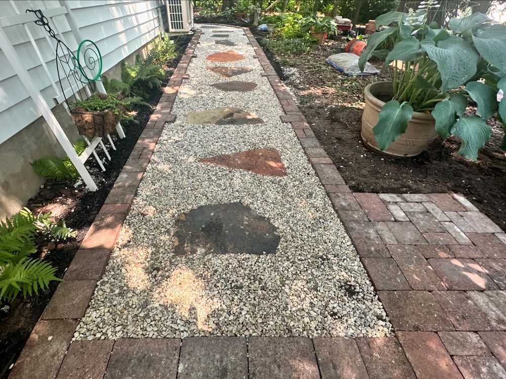 Our Walkway Construction service offers homeowners the opportunity to enhance their outdoor spaces with beautifully paved walkways, adding both functionality and aesthetic appeal to their property. for Matteo Hardscapes in Towson,  MD