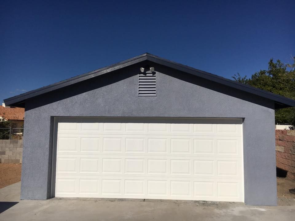 Our Garage Construction service offers homeowners a seamless experience, combining expert craftsmanship with personalized design to create functional and stylish garages that enhance both your property's value and aesthetic appeal. for Ant Farm Construction in Kingman, AZ